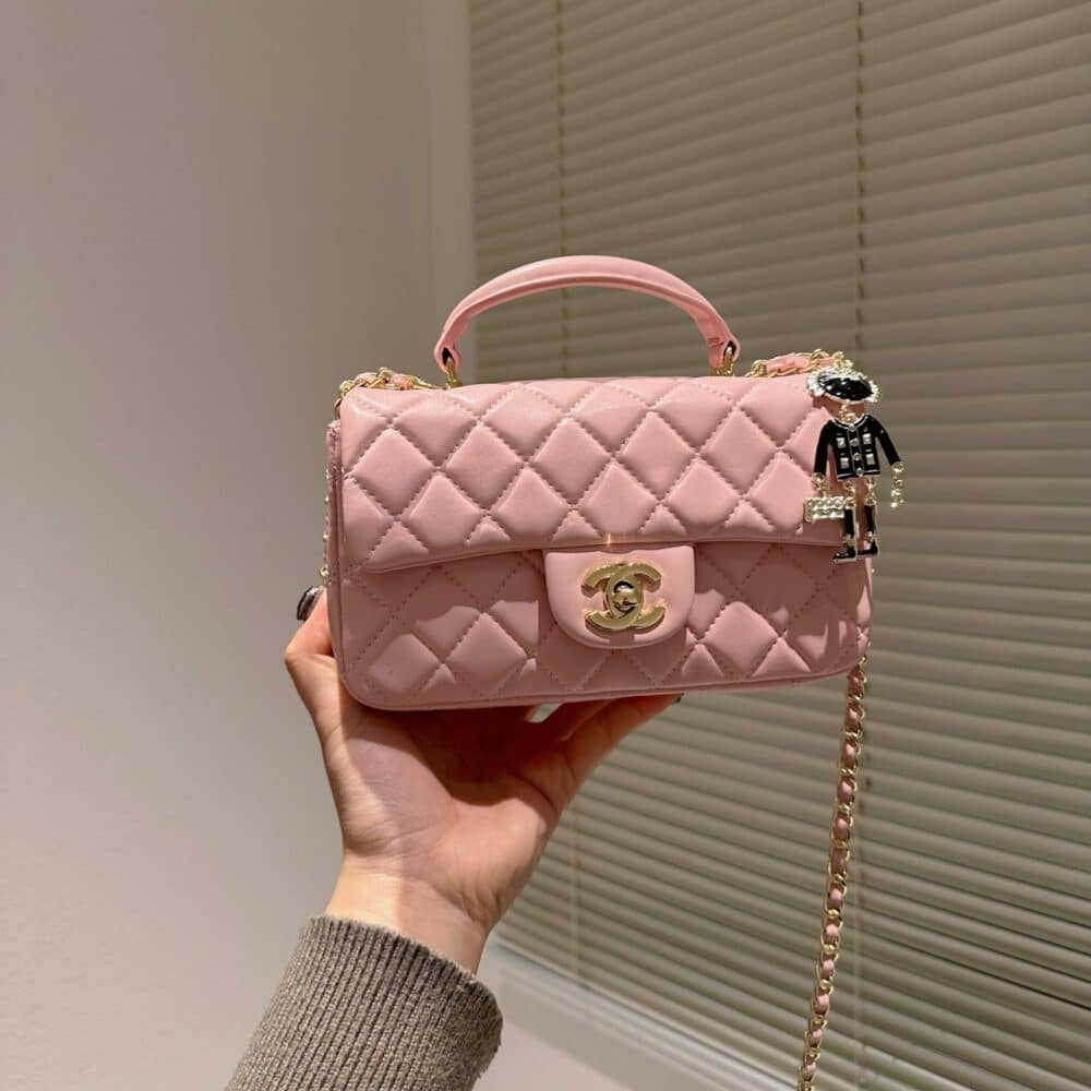 Alternative view of CHANEL MINI FLAP BAG WITH TOP HANDLE LION CHARM PINK 21CM