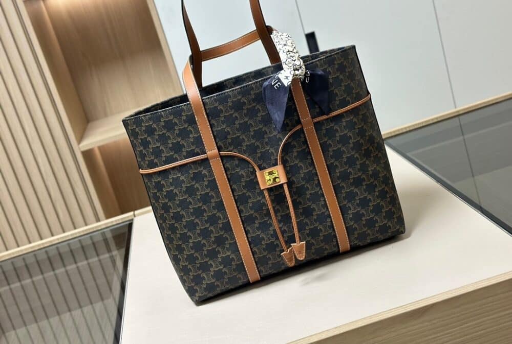 Alternative view of CELINE CABAS DRAWSTRING IN TRIOMPHE CANVAS AND CALFSKIN BLACK 36CM 113722BZJ 04LU