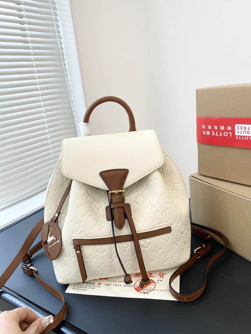 LOUIS VUITTON MONTSOURIS BACKPACK EMPREINTE WHITE AND BROWN 25CM - Image 3
