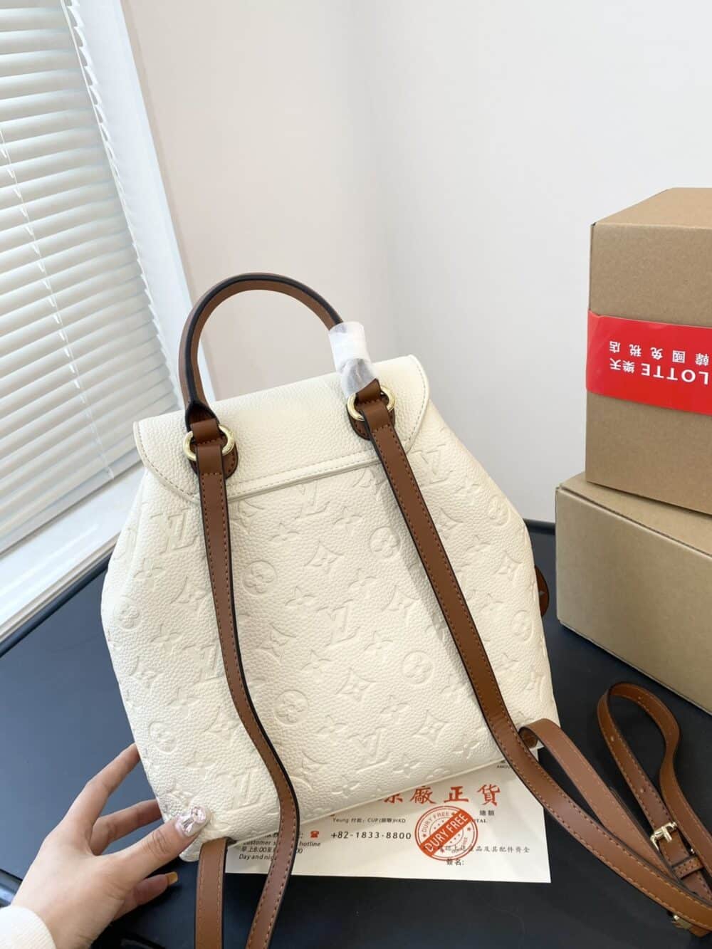 LOUIS VUITTON MONTSOURIS BACKPACK EMPREINTE WHITE AND BROWN 25CM - Image 6