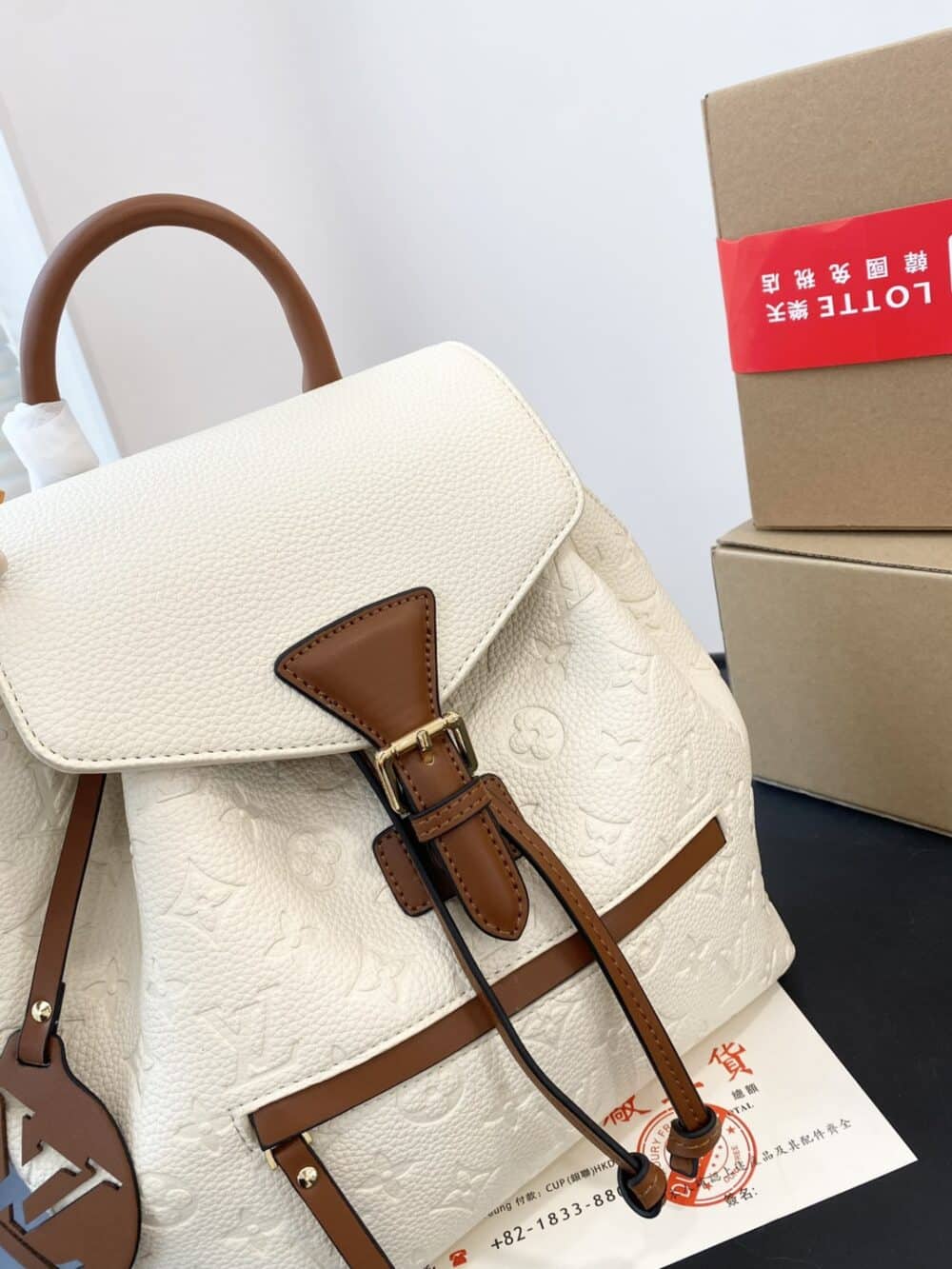 LOUIS VUITTON MONTSOURIS BACKPACK EMPREINTE WHITE AND BROWN 25CM - Image 7