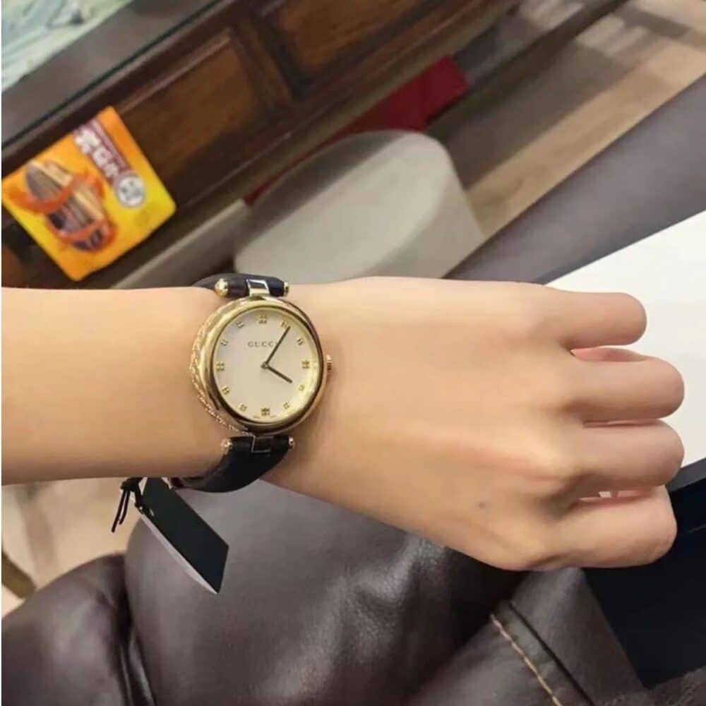 GUCCI DIAMANTISSIMA SWISS QUARTZ WITH BLACK STRAP AND GOLD TONE 27MM YA141404 - Image 5