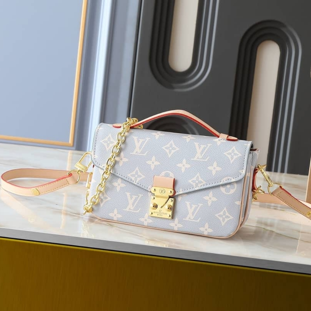 Alternative view of Louis Vuitton Pochette Métis East West Coated Canvas Trianon 21Cm M12429