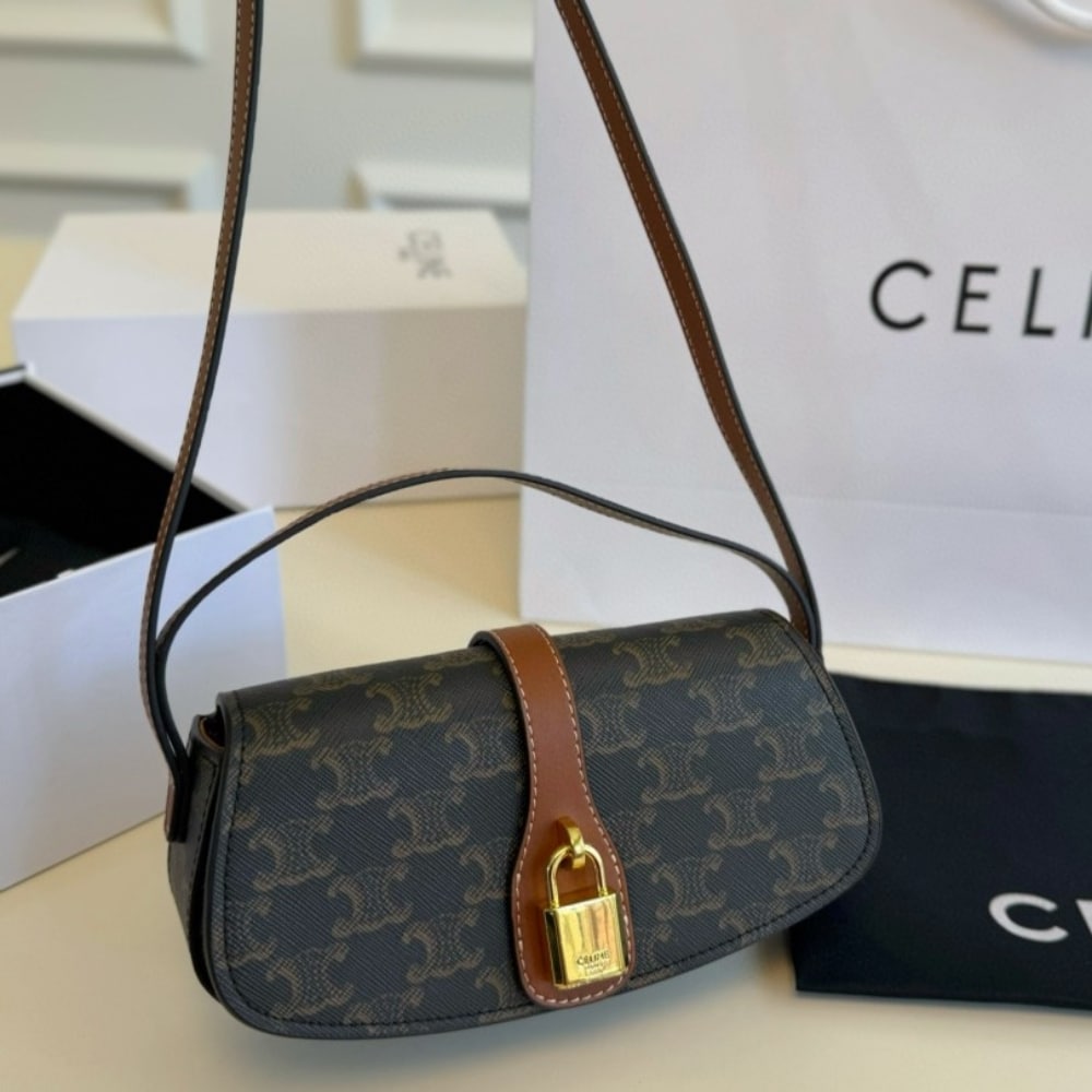 Alternative view of CELINE CLUTCH ON STRAP TABOU IN TRIOMPHE CANVAS AND CALFSKIN TAN 20CM 10I592DQ2 04LU