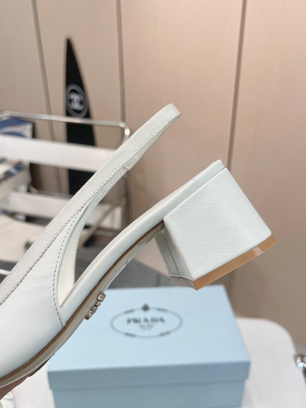 PRADA TRIANGLE LOGO BOW SLINGBACK PUMP IN WHITE - Image 5
