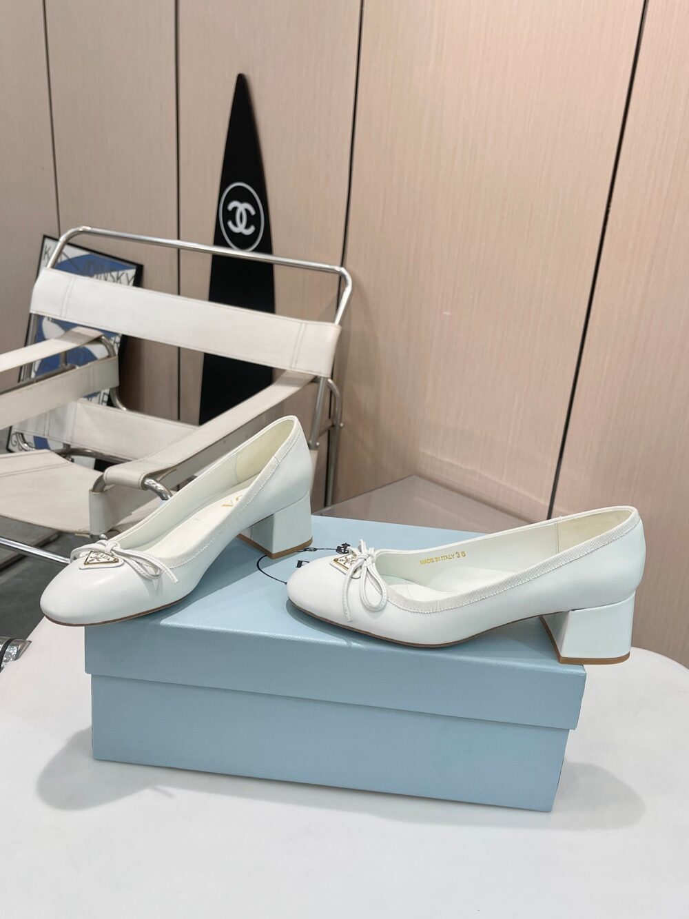 PRADA TRIANGLE LOGO BOW PUMP IN WHITE - Image 4