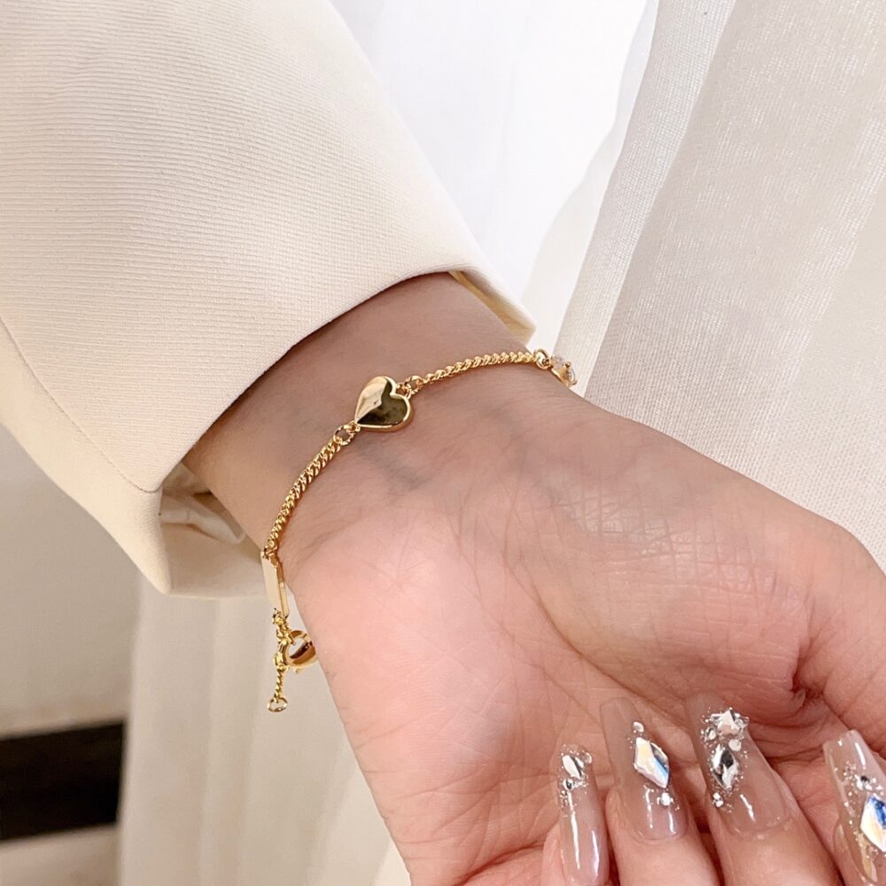 SAINT LAURENT CASSANDRE HEART CHARM BRACELET GOLD 701950Y15269137 - Image 5