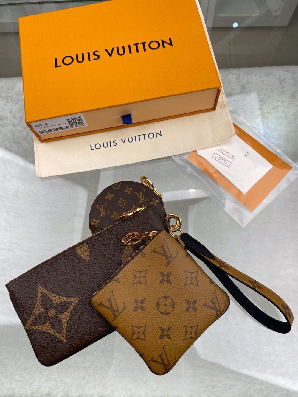 INVOICE FOR LOUIS VUITTON TRIO POUCH